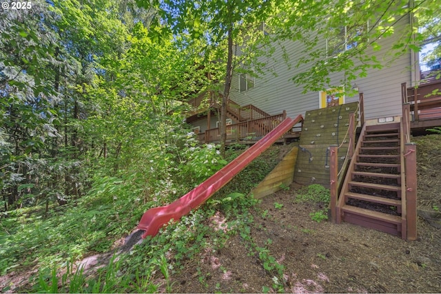 7540 SW Becky Ct, Beaverton, OR 97007 - view of play area featuring stairway and a deck