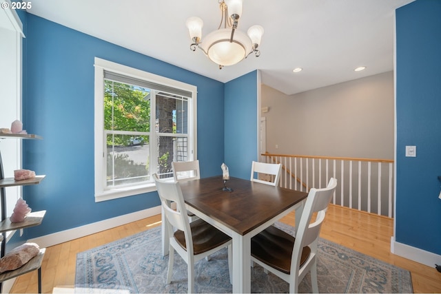 7540 SW Becky Ct, Beaverton, OR 97007 - dining space featuring a chandelier, wood finished floors, baseboards, and recessed lighting