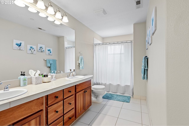 30366 SW Ruth St Unit 70, Wilsonville, OR 97070 - full bathroom featuring a sink, toilet, and visible vents