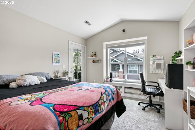30366 SW Ruth St Unit 70, Wilsonville, OR 97070 - bedroom with visible vents, carpet flooring, lofted ceiling, and access to exterior