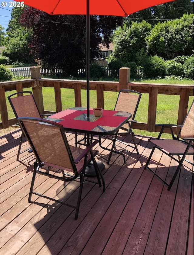 335 Kourt Dr, Eugene, OR 97404 - wooden deck with outdoor dining space and a yard