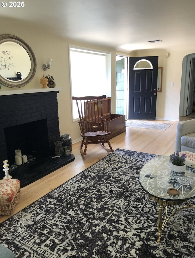335 Kourt Dr, Eugene, OR 97404 - living area with wood finished floors and a brick fireplace
