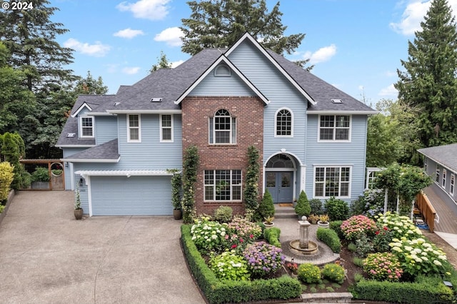 view of front of property with a garage