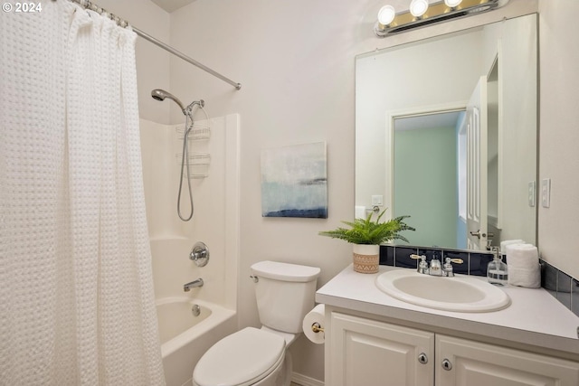 full bathroom featuring toilet, vanity, and shower / bath combination with curtain