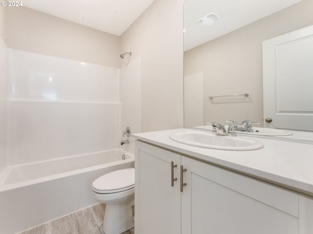 full bathroom with toilet, tub / shower combination, wood-type flooring, and vanity