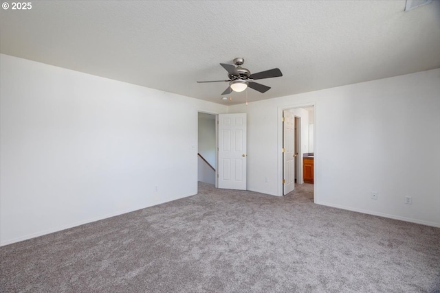 3232 Aspenwood Pl, Forest Grove, OR 97116 - unfurnished bedroom featuring carpet, a ceiling fan, connected bathroom, and baseboards