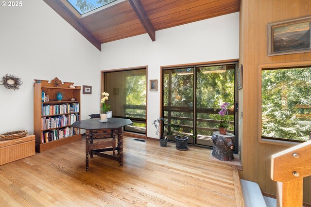 3820 SW Scholls Ferry Rd, Portland, OR 97221 - office area featuring beamed ceiling, a skylight, wood finished floors, and high vaulted ceiling