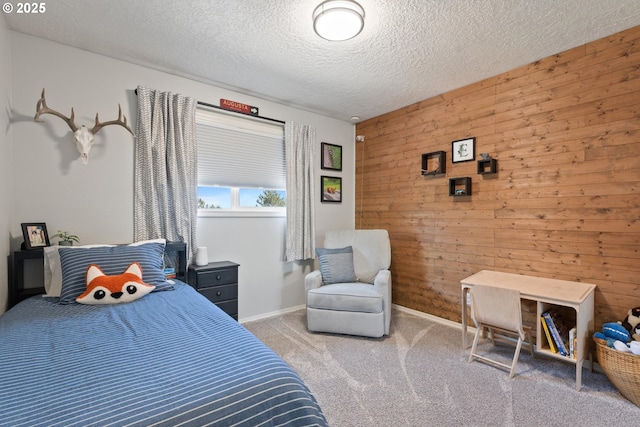 406 Balsa St, La Grande, OR 97850 - carpeted bedroom featuring wooden walls, a textured ceiling, and baseboards