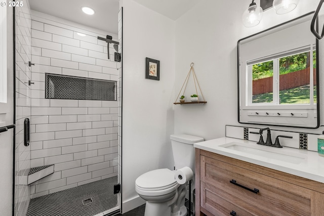 406 Balsa St, La Grande, OR 97850 - full bathroom featuring vanity, toilet, a shower stall, and recessed lighting