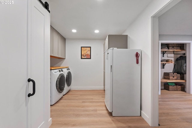 406 Balsa St, La Grande, OR 97850 - laundry area with washer and clothes dryer, recessed lighting, light wood-type flooring, and baseboards