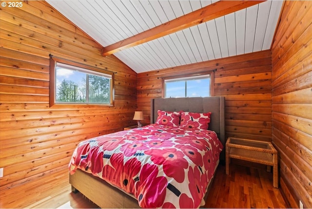 bedroom featuring lofted ceiling with beams, wooden ceiling, and hardwood / wood-style floors