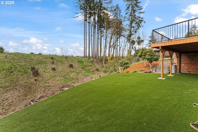 view of yard with a deck