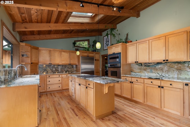 16637 Keasey Rd, Vernonia, OR 97064 - kitchen featuring built in appliances, wood ceiling, track lighting, light brown cabinetry, and a skylight