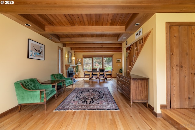 16637 Keasey Rd, Vernonia, OR 97064 - living area featuring wood finished floors, a wooden ceiling with exposed beams, and stairs