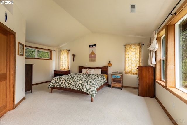 16637 Keasey Rd, Vernonia, OR 97064 - bedroom featuring vaulted ceiling, light colored carpet, and multiple windows