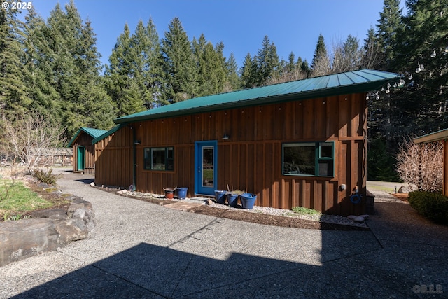 16637 Keasey Rd, Vernonia, OR 97064 - view of front of property with a metal roof and board and batten siding