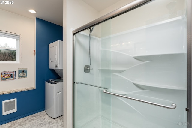 16637 Keasey Rd, Vernonia, OR 97064 - full bathroom with estacked washer and dryer, a shower stall, recessed lighting, and tile patterned flooring