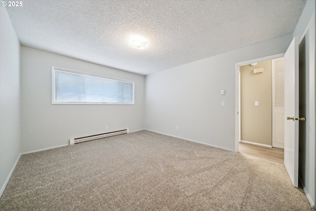 13155 SW Allen Blvd, Beaverton, OR 97005 - spare room featuring baseboard heating, carpet floors, a textured ceiling, and baseboards