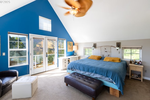 carpeted bedroom with multiple windows, access to outside, high vaulted ceiling, and ceiling fan