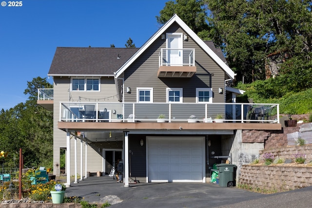 view of front of property with a garage