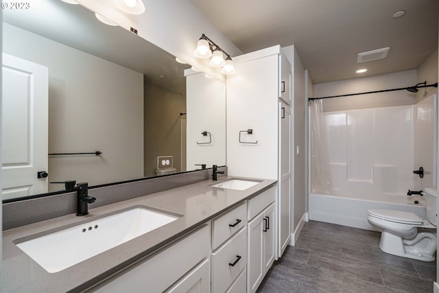 302 N Bridgeton Rd, Portland, OR 97217 - full bathroom with double vanity, shower / bath combo with shower curtain, and recessed lighting