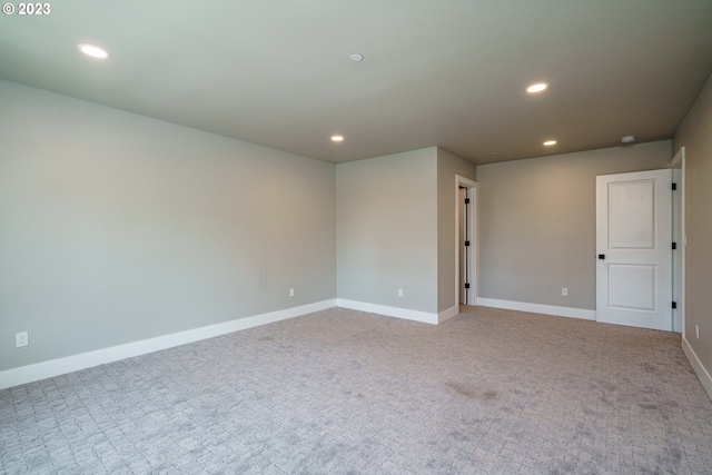302 N Bridgeton Rd, Portland, OR 97217 - carpeted empty room featuring recessed lighting