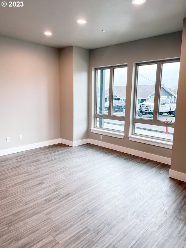 302 N Bridgeton Rd, Portland, OR 97217 - spare room featuring recessed lighting and wood finished floors