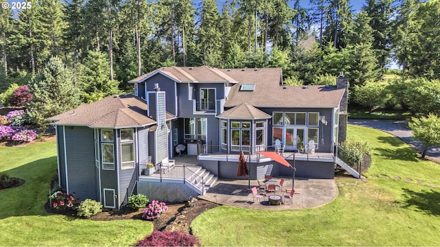 8623 Blackhawk Ct SE, Salem, OR 97317 - back of house with a patio area, a wooden deck, stairs, and a lawn