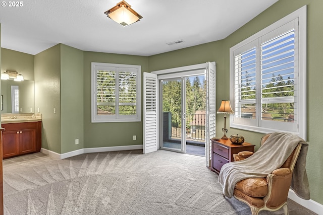 8623 Blackhawk Ct SE, Salem, OR 97317 - living area featuring baseboards, healthy amount of natural light, and light colored carpet