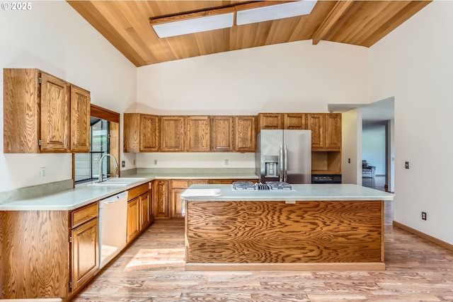 17708 SW Meadowbrook Way, Beaverton, OR 97078 - kitchen with stainless steel fridge with ice dispenser, dishwasher, high vaulted ceiling, a sink, and a center island