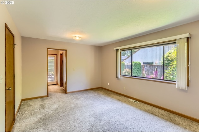 17708 SW Meadowbrook Way, Beaverton, OR 97078 - carpeted spare room featuring baseboards