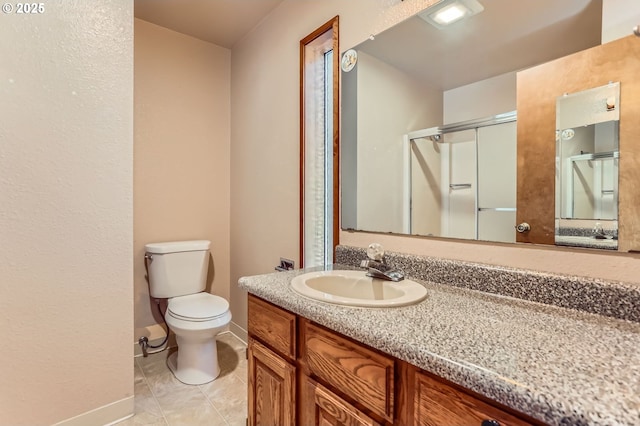 17708 SW Meadowbrook Way, Beaverton, OR 97078 - bathroom featuring vanity, toilet, baseboards, and a stall shower