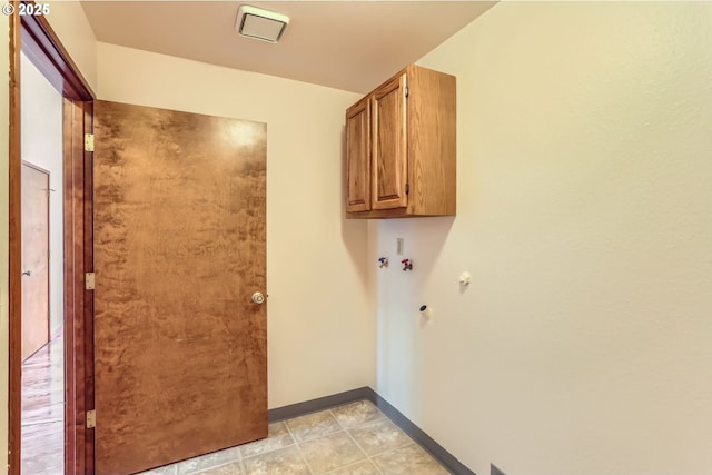 17708 SW Meadowbrook Way, Beaverton, OR 97078 - laundry area featuring cabinet space, baseboards, and hookup for a washing machine