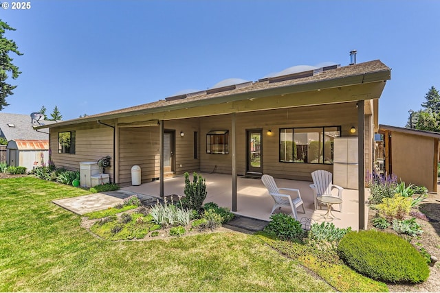 17708 SW Meadowbrook Way, Beaverton, OR 97078 - rear view of house with a patio area and a lawn