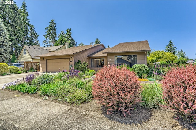 17708 SW Meadowbrook Way, Beaverton, OR 97078 - view of front of property with an attached garage, driveway, and a chimney