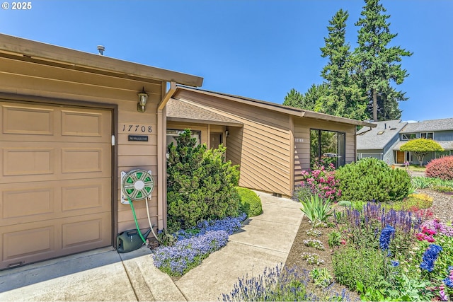 17708 SW Meadowbrook Way, Beaverton, OR 97078 - property entrance featuring an attached garage