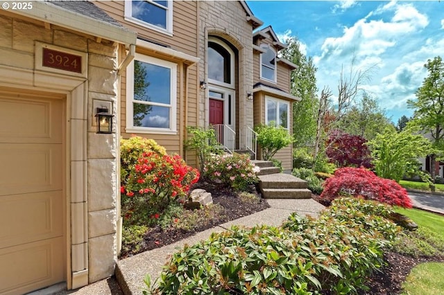 entrance to property featuring a garage