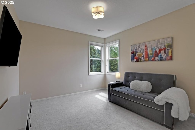 sitting room featuring baseboards, carpet, and visible vents