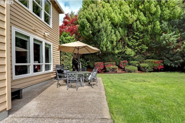 view of patio with outdoor dining area