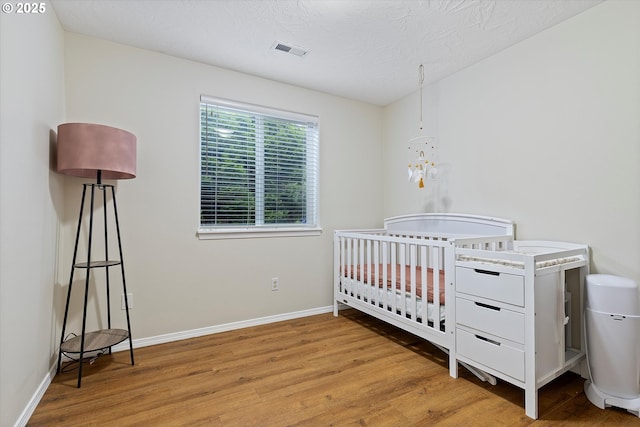1218 Mt View Ln, Molalla, OR 97038 - bedroom featuring wood finished floors and a textured ceiling