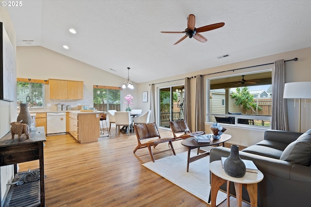 1218 Mt View Ln, Molalla, OR 97038 - living area with lofted ceiling, ceiling fan, light wood-type flooring, healthy amount of natural light, and a textured ceiling