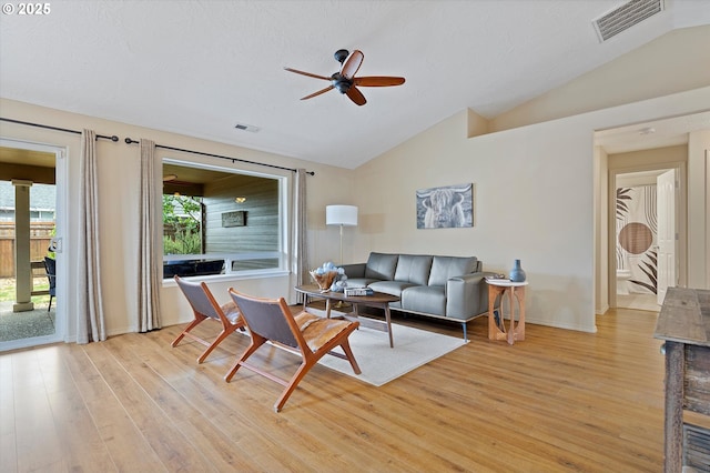 1218 Mt View Ln, Molalla, OR 97038 - living room featuring vaulted ceiling, a ceiling fan, and light wood finished floors