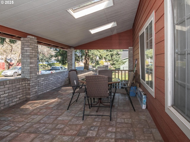 view of patio with outdoor dining area