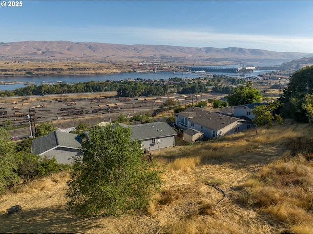 bird's eye view featuring a water and mountain view