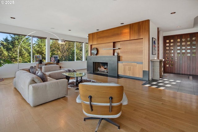 living room with light hardwood / wood-style floors