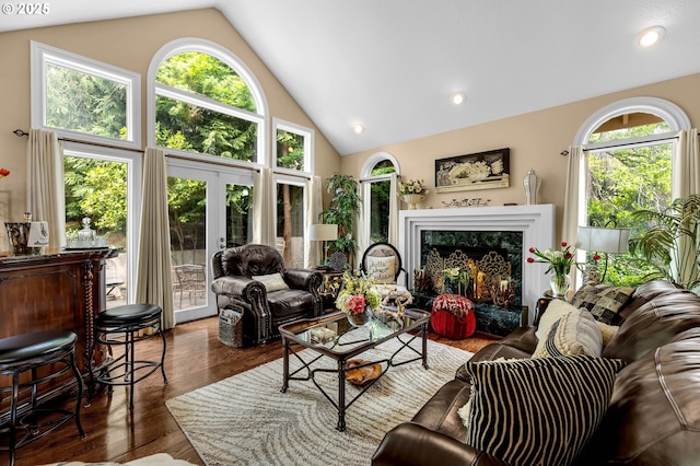 3420 SE 144th Ct, Vancouver, WA 98683 - living area featuring plenty of natural light, french doors, wood finished floors, high vaulted ceiling, and recessed lighting