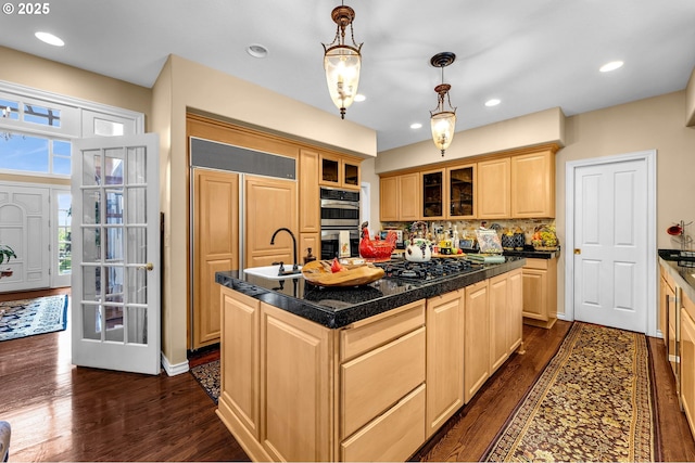 3420 SE 144th Ct, Vancouver, WA 98683 - kitchen with light brown cabinets, double oven, tile countertops, glass insert cabinets, and dark wood-style floors