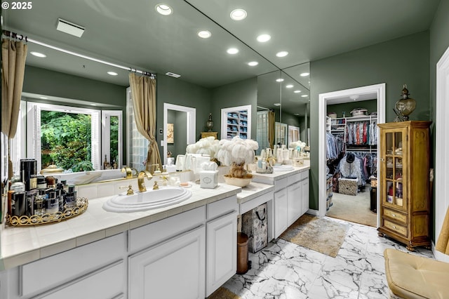 3420 SE 144th Ct, Vancouver, WA 98683 - full bath featuring recessed lighting, double vanity, marble finish floors, a spacious closet, and a shower with shower curtain