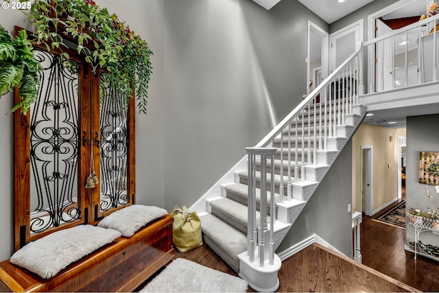 3420 SE 144th Ct, Vancouver, WA 98683 - foyer with wood finished floors, baseboards, stairway, and a high ceiling