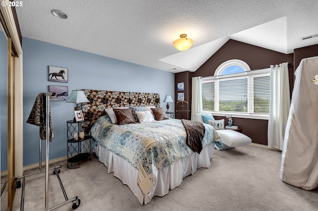 3420 SE 144th Ct, Vancouver, WA 98683 - bedroom with light colored carpet, baseboards, vaulted ceiling, and a textured ceiling